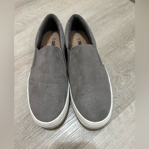 Gray slip on sneakers